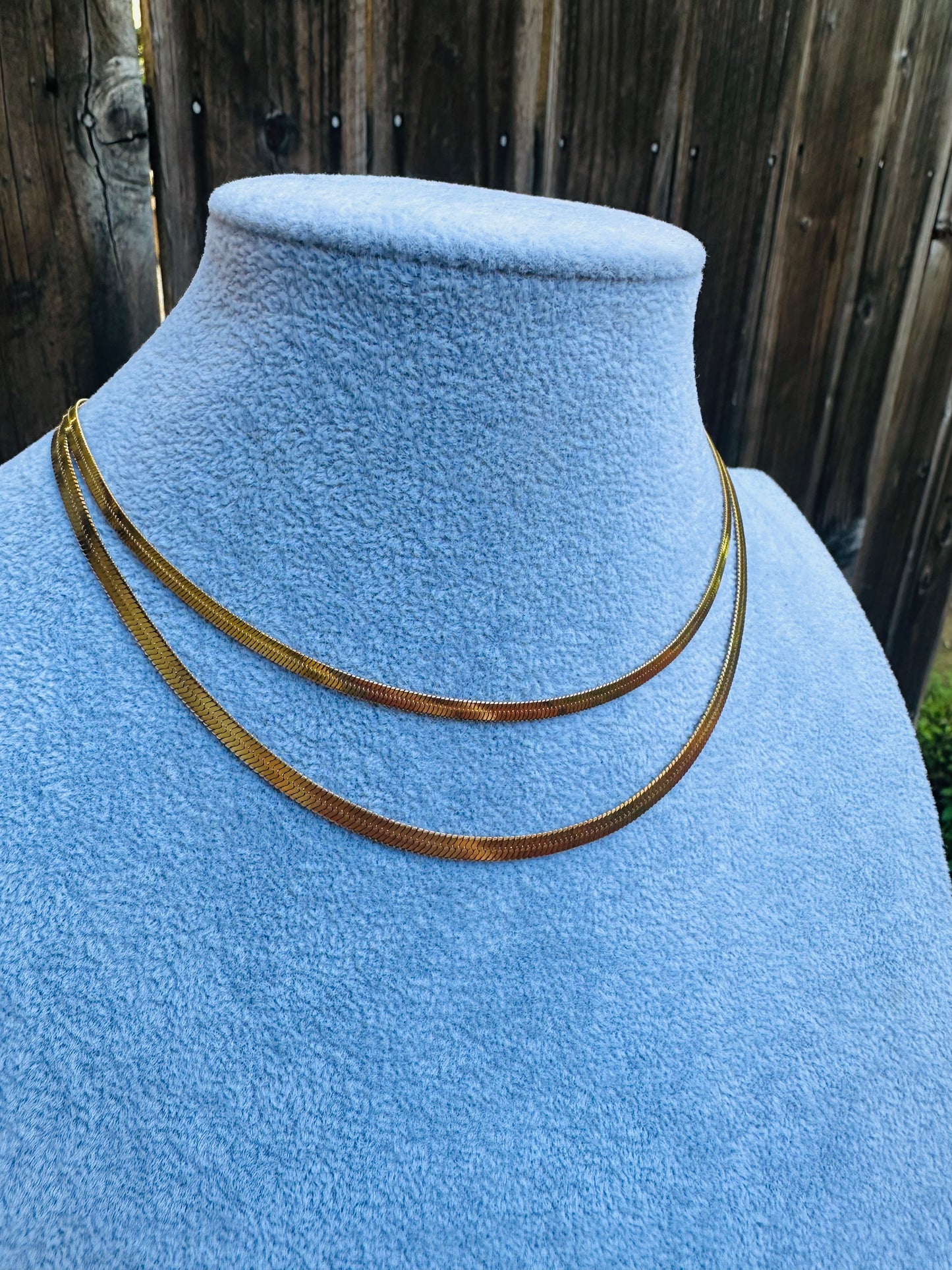 Thin Width Necklace on Top. Medium Width Necklace on bottom.